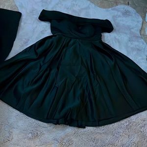 Black off shoulder knee length dress
